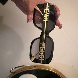 Fendi Women's Sunglasses in Black with Gold Detailing